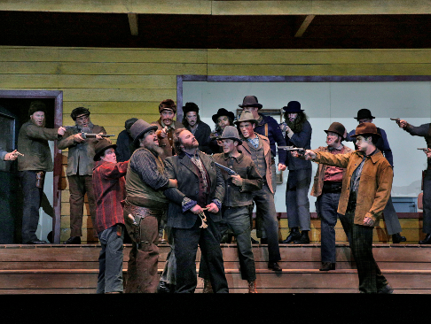 19 Gwyn Hughes Jones (Dick Johnson) and ensemble cast in 'The Girl of the Golden West' (c) Ken Howard for Santa Fe Opera, 2016.png