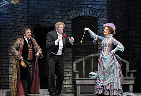 Michael Spyres as Alfred, Bo Skovhus as Eisenstein and Juliane Banse as Rosalinde. Act 3. [Photo by Dan Rest]