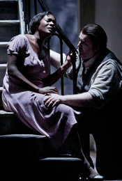Elizabeth Llewellyn as Mimi and Gwyn Hughes-Jones as Rodolfo [Photo by Robert Workman courtesy of English National Opera]