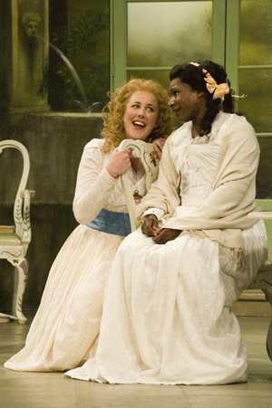 Julia Riley as Dorabella and Elizabeth Llewellyn as Fiordiligi [Photo by Fritz Curzon courtesy of Opera Holland Park]