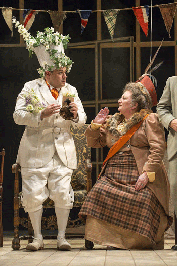 Mark Wilde as Albert Herring and Jennifer Rhys-Davies as Lady Billows. [Photo by Richard Hubert Smith courtesy of English Touring Opera]
