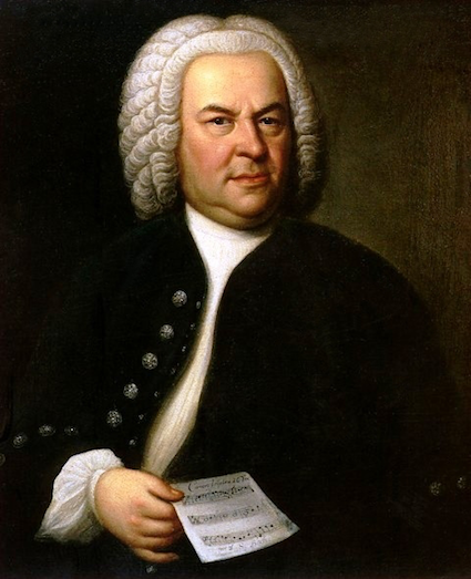 Johann Sebastian Bach (aged 61) in a portrait by Elias Gottlob Haussmann [Source: Wikipedia]