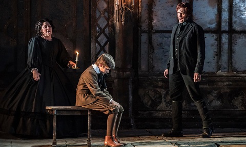 Sophie Bevan as the Governess, Leo Jemison as Miles and Ed Lyon as Quint. Photograph Johan Persson .jpg