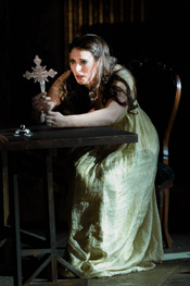 Amanda Echalaz as Tosca [Photo by Robert Workman courtesy of English National Opera]