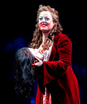 Salome (Voigt) revels in finally getting Jokanaan's head [Photo by Scott Suchman courtesy of Washington National Opera]