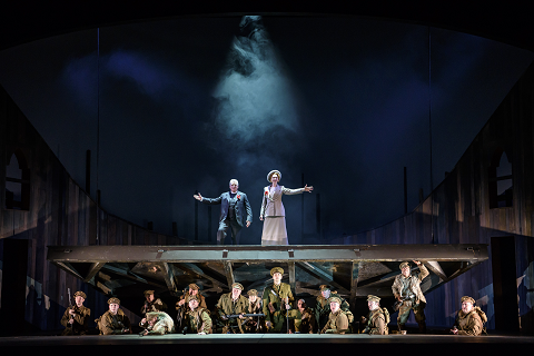 WNO In Parenthesis. Peter Coleman-Wright (Bard of Britannia), Alexandra Deshorties (Bard of Germania) and Company. Photo credit - Bill Cooper 942.png